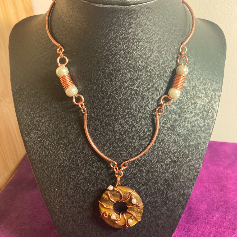 Handmade copper necklace with tigers eye wrapped pendant